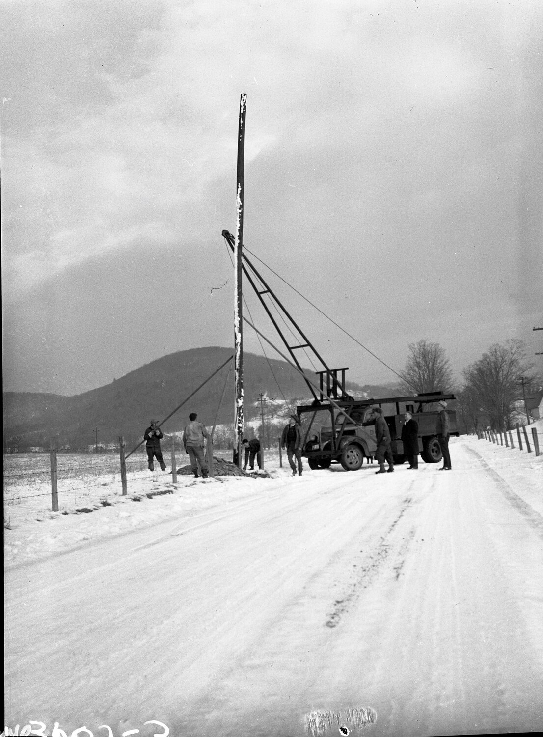 First pole installed by REA (now  DCEC), 1944.